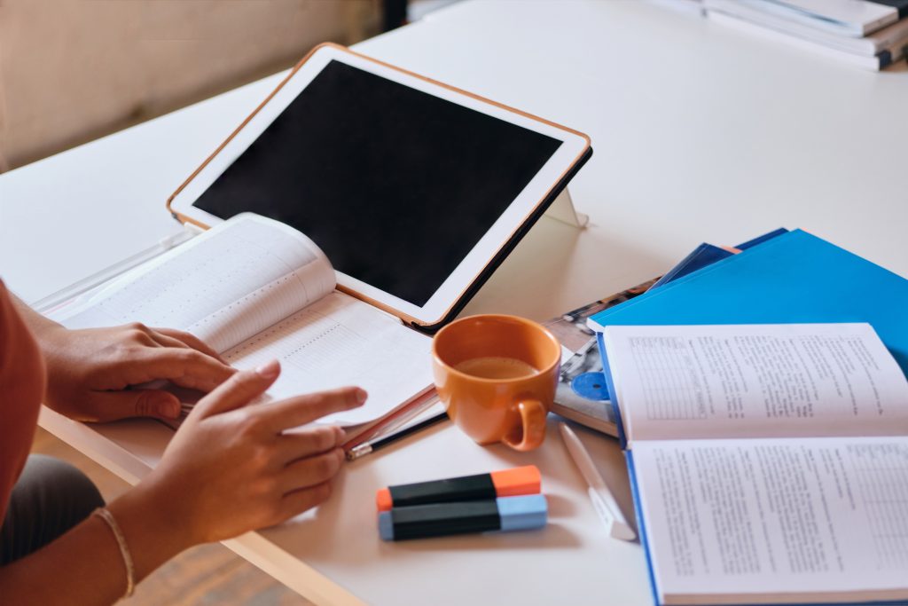 Best SAT Prep Books And Free Online Resources For A 1500 Score In 2026 Close Up Photo Girl Studying With Cup Coffee Desk Cozy Home 1024x683 