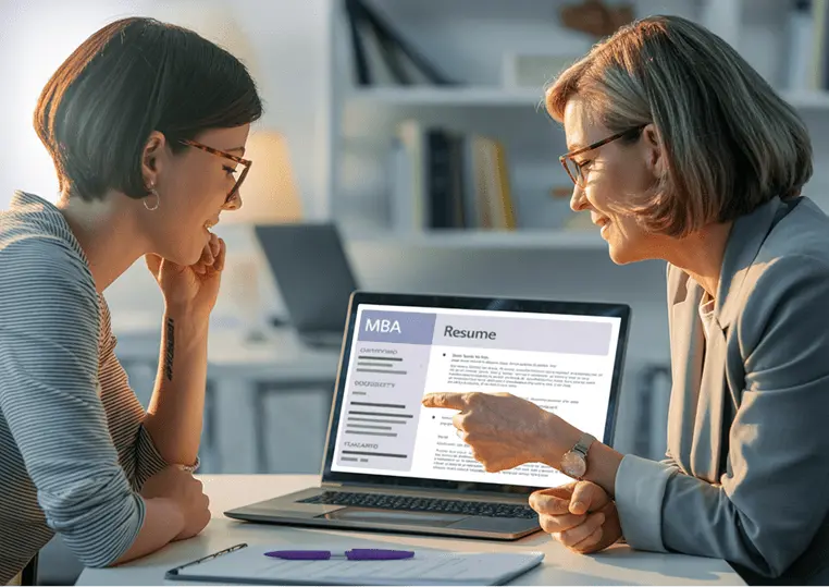 MBA consultant reviewing a candidate’s resume during an MBA profile evaluation session