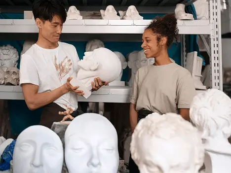 Students discussing art and sculpture as part of humanities content for ACT online coaching